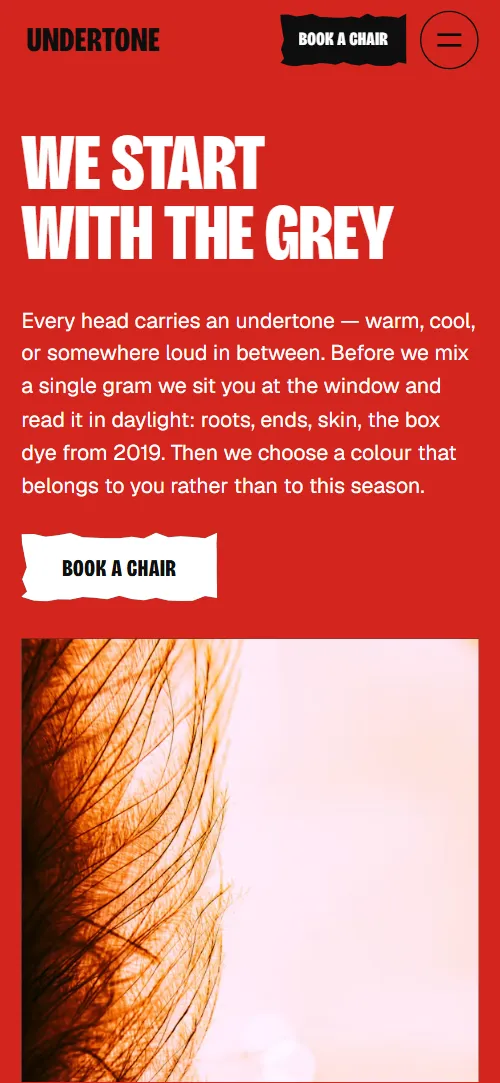 Hair salon website template: first screen on a phone